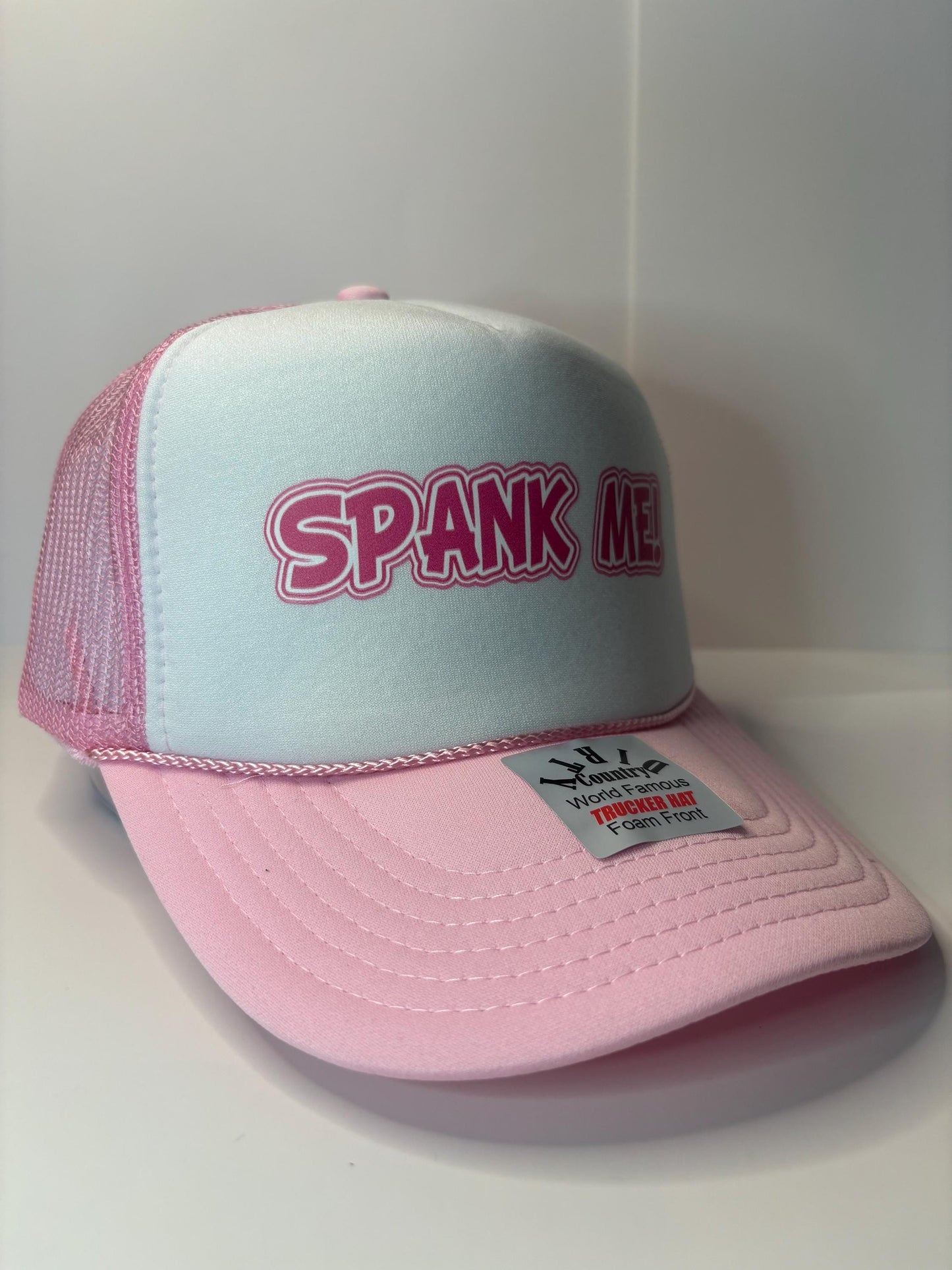 Spank Me Custom Trucker Hat with parody design, Adjustable Snapback Closure, and Ideal for Any Occasion